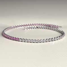 Add a touch of elegance to your wrist with our Diamond & Natural Pink Sapphire Custom 50-50 Tennis Bracelet. Handmade with love, this stunning piece features lab-grown diamonds, creating a luxurious sparkle. Perfect as a Christmas gift or for any special occasion. Don't miss out on our Cyber Sale. Order now!𝐅𝐞𝐚𝐭𝐮𝐫𝐞𝐬:• 𝐌𝐚𝐝𝐞 𝐭𝐨 𝐎𝐫𝐝𝐞𝐫• 𝐌𝐞𝐭𝐚𝐥: 𝟏𝟒𝐊 | 𝟏𝟖𝐊• 𝐁𝐚𝐧𝐝 𝐂𝐨𝐥𝐨𝐫𝐬: Rose Gold, Yellow Gold & White Gold• 𝐂𝐮𝐬𝐭𝐨𝐦 𝐂𝐫𝐨𝐜𝐨𝐝𝐢𝐥𝐞 𝐋𝐨𝐜𝐤𝐒𝐭𝐨𝐧𝐞:• 𝐒𝐭 Fine Jewelry Diamond White Bracelet For Anniversary, Diamond White Fine Jewelry Bracelet For Anniversary, Cubic Zirconia Bracelets For Anniversary Fine Jewelry, Fine Jewelry Cubic Zirconia Bracelets For Anniversary, Cubic Zirconia Bracelets For Anniversary, Anniversary Fine Jewelry Bracelet In Diamond White, Anniversary Fine Jewelry Diamond White Bracelet, Cubic Zirconia Tennis Bracelet For Anniversary, Flexible Round Diamond Bracelet Fine Jewelry