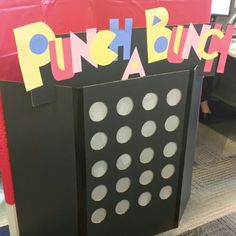 an office cubicle with punch a bunch cut out of it's sides and the word punch a bunch on top