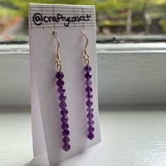 This Hand Crafted Pair Are Made From: 14k Gold Filled Post And Wire 4mm Amethysts Everyday Purple Dangle Earrings, Everyday Purple Drop Earrings, Everyday Purple Jewelry With Ear Wire, Minimalist Purple Earrings With Ear Wire, Everyday Hypoallergenic Purple Earrings, Purple Faceted Dangle Earrings, Everyday Purple Earrings With Ear Wire, Everyday Amethyst Dangle Earrings, Everyday Amethyst Dangle Jewelry