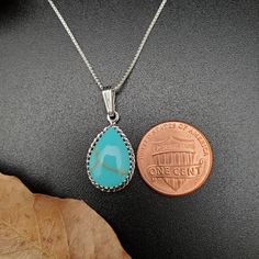 "Visit our on-line shop at: Etsy.com/shop/AlbuquerqueDesigns *sterling silver necklace pendant *pendant with silver box chain necklace 18\" *southwestern jewelry *turquoise / kingman turquoise *calibrated pre-cut stones: 15x10mm teardrop shape *all jewelry items are made to ship, slight variations in stones will occur comparing to pictures *size of a penny is 19mm or a dime is 18mm in diameter for comparing size with jewelry items *handcrafted in USA *free convenient gift box *free shipping in U Sterling Silver Teardrop Turquoise Necklace For Gifts, Southwestern Sterling Silver Necklace Perfect For Gifts, Nickel-free Teardrop Turquoise Sterling Silver Necklace, Nickel-free Sterling Silver Turquoise Necklace, Southwestern Sterling Silver Teardrop Turquoise Necklace, Sterling Silver Turquoise Teardrop Necklace, Sterling Silver Turquoise Teardrop Necklace For Jewelry Making, Southwestern Turquoise Sterling Silver Necklace, Nickel-free Teardrop Turquoise Necklace In Sterling Silver