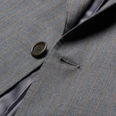 NEW Marked EU Size: 54 US Size: 44 R7 Drop - Regular Fit Gray Striped 100% Wool Super 130's Three Button Closure Fully Lined Double Vented Unfinished Sleeve Buttonholes (Buttons Included) Flap Pockets Notch Lapel Flat Front Pants Made In Italy Jacket Measurements: Shoulder: (seam to seam) 18.5" Jacket Length: 30.5" Sleeve Length (top of the shoulder seam to the edge of the vented side of the sleeve): 26" Chest: 45" Waist: 42.5" Pants Measurements: Waist: 37.5" Additional Fabric To Expand Waist 1 Luxury Fitted Suits With Button Closure, Luxury Office Suits With Button Closure, Tailored Suits With Button Closure For Office, Luxury Tailored Suits With Button Closure, Tailored Luxury Suits, Luxury Three-piece Suit With Single Button For Office, Elegant Three-piece Suit With Buttons For Office, Elegant Three-piece Suit For Business, Elegant Three-piece Business Suit