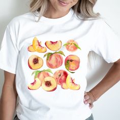 Peach Trendy Crewneck cottagecore shirt Graphic Tees For Women fruit tshirt comfort colors gift for foodie Trending Fruit Shirt Please message us if you want your t-shirt in one of the additional colors or a sweatshirt.  Comfort Colors garment-dyed t-shirt made 100% with ring-spun cotton. The soft-washed, garment-dyed fabric brings extra coziness to your wardrobe while the relaxed fit makes it an excellent daily choice.  Please keep in mind that the design is scaled down for smaller t-shirt sizes. T-SHIRT CARE INSTRUCTIONS: Machine wash cold Wash inside-out, with similar colors Tumble dry low. Hang-dry for longer life Cool iron inside-out. Do not use bleach Do not iron directly on the print Do not dry-clean Thank you for supporting our small business! Please visit our shop https://www.etsy Peaches Graphic, Y2k Style Aesthetic, Gothic Baby, Fruit Shirt, Vintage Clipart, Punk T Shirt, Baby Graphic Tees, Y2k Baby Tee, Y2k Clothing