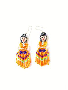 Huichol earrings These handmade beaded earrings are so colorful and lightweight. They are unique and made by the huichol artisans Huichol art and handcrafts are popular worldwide because of the beauty of the jewelry they make and all the art and tradition that the community represents 100% handmade Please notice that due all the light effects, color may vary slightly All orders are shipped using Mexican Postal Service and it takes: 15-25 bussines days (North America). 20-30 bussines days (Europe Multicolor Fair Trade Beaded Earrings, Artisan Orange Beaded Earrings, Fair Trade Beaded Dangle Earrings, Handwoven Orange Beaded Earrings For Gift, Handwoven Orange Beaded Earrings As Gift, Traditional Yellow Handwoven Beaded Earrings, Traditional Handwoven Multicolor Earrings, Traditional Multicolor Handwoven Earrings, Traditional Orange Handmade Earrings