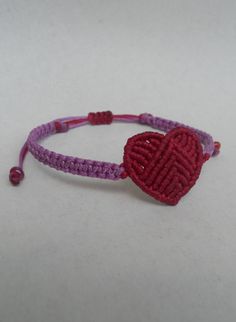 Valentine's dayRed heart macrame by LuckyRatJewellery on Etsy Heart-shaped Friendship Bracelets With Sliding Knot For Valentine's Day, Purple Adjustable Heart Bracelet For Valentine's Day, Valentine's Day Heart Friendship Bracelets With Adjustable Cord, Adjustable Purple Heart Bracelet For Valentine's Day, Valentine's Day Heart Bracelet With Sliding Knot, Purple Macrame Friendship Bracelets As Gift, Pink Macrame Braided Bracelets As A Gift, Macrame Bracelets With Waxed Cord As A Gift, Handmade Adjustable Heart Friendship Bracelets