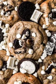 cookies and marshmallows are arranged on top of each other with chocolate chips