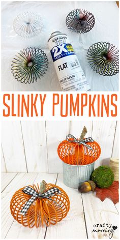 an orange pumpkin sitting on top of a white table next to other fall decor items