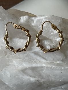 Simple and classic 10 karat gold earrings, with a twisted rope design.  Very dainty and sweet.. would make a lovely gift.  Circa early 2000s.  In excellent condition! Measures approx 3/4 inches as shown in pic. Weight 1.05 grams Vintage Tarnish Resistant Hoop Earrings Gift, Vintage Tarnish-resistant Hoop Earrings Gift, Vintage Gold Plated Hoop Jewelry, Twisted 14k Gold Earrings, Vintage Small Hoop Tarnish Resistant Jewelry, Vintage Tarnish-resistant Hoop Jewelry, Vintage Yellow Gold Tarnish-resistant Hoop Earrings, Vintage Hoop Jewelry For Everyday, Vintage Small Hoop Earrings, Tarnish Resistant