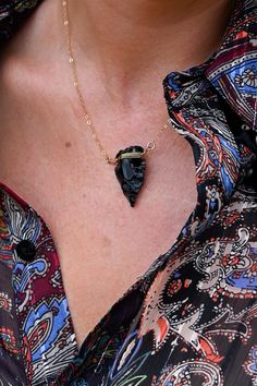 "This Obsidian arrowhead necklace has the most beautiful angles. Aside from the perfect everyday necklace that will go with anything, this beauty is your reminder that you are limitless. Would look so amazing with our Herkimer gold choker. The arrowhead is a powerful symbol known throughout history. Wearing an arrowhead around your neck is a symbol of protection & strength. It's also an icon of courage, protecting its wearer from negative energy. ▲ Obsidian arrowhead pendant ▲ 14k gold fill cabl Arrowhead Wire Wrapped Necklaces For Gifts, Wire Wrapped Arrowhead Necklace For Gift, Spiritual Arrowhead Necklace Gift, Unique Arrowhead Jewelry With Natural Stones, Unique Arrowhead Natural Stone Jewelry, Handmade Arrowhead Jewelry Gift, Adjustable Arrowhead Necklace Gift, Handmade Spiritual Arrowhead Necklace, Handmade Black Arrowhead Necklace