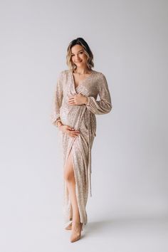 Shine like a star in this sparkly dress, radiating glamour and confidence. It's the ideal choice for events where you want to make a lasting impression. Expecting mothers can embrace both style and comfort with our fitted gold sparkly maternity dress. It offers a flattering fit without compromising on dazzling appeal. Celebrate the holiday season in style with our plus size gold sequin dress. It's designed to make curvy women feel fabulous and festive. Capture the holiday spirit with sophisticat Sequin Maternity Dress, Maternity Evening Gowns, Tulle Maternity Dress, Maternity Evening, Dress For Pregnant Women, Maternity Wrap Dress, Evening Wrap, Shine Like A Star, Christmas Dress Women