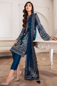 Teal Blue Heavily Embroidered Pakistani Salwar Kameez Party Wear is a perfectly stitched masterpiece that has the perfect balance of royalty and grace. The Kameez Salwar comes in an alluring pearl white shade that will steal everyone's hearts at the very first glance with its charm and elegance. Embroidered Kameez: The Pakistani Salwar Kameez has an alluring white shade and it comes in a premium tissue fabric. Hand-crafted details of pearls and motifs enhance the glamour of this embellished kame Pakistani Design, Desi Outfits, Pakistani Salwar, Salwar Kamiz, Pakistani Salwar Kameez, Elegant Embroidery, Embroidered Chiffon, Punjabi Suit, Salwar Kameez Designs