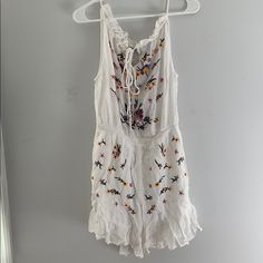 Cute White Embroidered Romper. New With Tags. I Ordered The Wrong Size And Forgot To Return It. Never Worn. Size 8 Us Sleeveless Embroidered Jumpsuits And Rompers For Summer, Embroidered Cotton Jumpsuits And Rompers For Spring, Casual Embroidered Jumpsuits And Rompers For Spring, Embroidered Cotton Jumpsuits And Rompers For Summer, Light Pink Lace Dress, Embroidered Romper, Sleeveless Playsuit, Velvet Shift Dress, Navy Blue Mini Dress