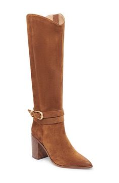 A buckled strap wraps around the ankle of a knee-high boot balanced by a pointy toe and stacked block heel. 3 1/4" heel 14" shaft; 15 1/4" calf circumference. Regular calf 14" shaft; 17 1/4" calf circumference. Wide calf Side zip closure with elastic gore inset Leather upper/synthetic lining and sole Made in Brazil Ankle Strap Heeled Boots For Workwear In Fall, Fall Knee-high Boots With Buckle Closure, Elegant Knee-high Boots With Buckle For Fall, Elegant Fall Knee-high Boots With Buckle Closure, Chic Knee-high Heeled Boots With Buckle Closure, Casual Fall Jacket, Buckled Boots, Buckle Boots, Wide Calf