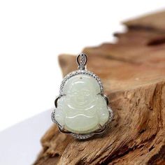 Design Concept--- This jade necklace depicts a buddha. Also known as the "enlightened one". Founder of Buddhism who later became known as “the Buddha,” lived during the 5th century B.C. His teachings are deep and once a person has allowed themselves to learn those teaching, it is common for them to bring those concepts into every aspect of their life. A pendant with Buddha is common so that they have the blessings with them no matter where they are. The term Buddha literally means enlightened on Buddha Pendant Necklace, Classic Bangles, Laughing Buddha, White Gold Sapphire, Buddha Pendant, Jade Necklace, White Jade, Jade Jewelry, Jade Pendant