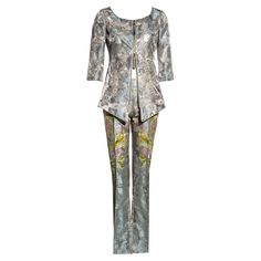 ▪ Gianfranco Ferre blue silk jacquard pant suit ▪ Scoop neck jacket with double-ended zipper ▪ Armhole cut-outs ▪ three-quarter length sleeves ▪ Straight leg pants with zippers at the inseams ▪ Green, pink, and silver embroidery ▪ 50% silk, 50% acetate ▪ IT 40 - FR 36 - UK 8 ▪ Spring-Summer 2000 Velvet Bustier, Wool Knitted Dress, Evening Blouses, Leather Jumpsuit, Silver Embroidery, Box Pleat Skirt, Evening Skirts, Embroidered Pants, Gianfranco Ferre