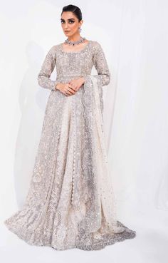 Pakistani Bridal Dress in Classic Gown Lehenga Style is a royal attire adorned with Hand-crafted details of embellishments. Custom sizes. Fast shipping. Pakistani Bridal Gown, Gown Lehenga, Lehenga With Dupatta, Royal Attire, Grey Lehenga, Classic Gown, Dupatta Dress, Pakistani Bridal Dress, Raw Silk Lehenga