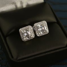 Own the room with these stunning GRA certified VVS1 clarity halo earrings. These shine with incredible intensity in person, with a stunning 0.60 carat or 2.00 carat center stone surrounded by a ring of smaller brilliant cut round stones for extra fire and brilliance. Moissanite is scientifically proven to reflect light more (higher light refraction rate) than any CZ or replica diamond, as well as most common quality natural diamonds. They are hand set and finished with quality screw-backs, just Martini Set, Light Refraction, Expensive Diamond, Halo Diamond Earrings, Halo Stud Earrings, Halo Earrings, Solitaire Studs, Halo Earrings Studs, Moissanite Earrings