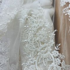 Let the beauty of our Beaded & Corded lace fabric lift the elegance of any special occasion. Made from 100% Polyester Net Mesh, this beautiful fabric is lovingly embroidered with pearls and sequins. It is the perfect choice for wedding dresses, evening gowns, quinceanera dresses, dance costumes, and more. Our collection of Beaded and Corded couture lace and bridal lace, has something for every woman who wants to look her best. Whether it's for a special occasion or for a momentous evening, our f Dresses Dance, Corded Lace Fabric, For Wedding Dresses, Beaded Lace Fabric, Bridal Lace Fabric, Corded Lace, Lace Evening Dresses, Dresses Evening, Bridal Lace