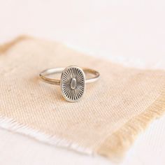 A kiss from the sun.  Full of life and warmth. This sweet stamped silver ring is perfect alone or stacked with other rings.  Sterling silver.  Please select your ring size during checkout. Your jewelry will arrive beautifully gift wrapped in a small box. Multiple items will be combined, unless separate boxes are reques Spiritual Silver Stackable Rings For Everyday, Silver Spiritual Stackable Rings For Everyday, Silver Dainty Stamped Ring, Sterling Silver Sun Design Ring For Gift, Dainty Stamped Silver Rings, Sterling Silver Sun Design Ring, Sterling Silver Ring With Sun Design For Gift, Sterling Silver Ring With Sun Design, Rings Sterling Silver