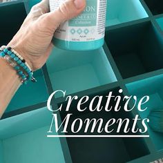 a person holding a cup in their hand with the words creative moments above it and below it