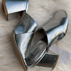 Nwt Silver Divided Mules/Sandals Excellent Condition Never Worn Silver Open Toe Casual Heels, Casual Silver Open Toe Heels, Casual Silver High Heel Sandals, Silver Slip-on Heels For Summer, Casual Silver Heels For Beach, Silver Mules With Wrapped Heel For Spring, Silver Wrapped Heel Mules For Spring, Silver Casual Heels For Spring, Casual Silver Heels For Spring