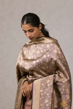 "\nAn exquisite\u00a0aadha Shikaargah dupatta made of resplendent Katan silk.\u00a0Adorned with\u00a0regal animal motifs\u00a0amidst a landscape of vines rendered in\u00a0intricate gold zari weaves.\n\n\nColor\u00a0-  An elegant\u00a0shade of Deep Purple\n\n\nFabric\u00a0- Soft as butter, pure Katan silk\n\nTechnique\u00a0- Classic handwoven Banarasi art passed down through generations of weavers.\n\nSpeciality\u00a0-\u00a0With a melange of motifs of birds, animals, flora and fauna, Shikaargah is a testament to the skill of\u00a0Banarasi weavers.\u00a0\n\nTilfi Promise\u00a0- Pure. Handloom. Banaras.\n\nSince this product is handwoven, there might be slight irregularities. But don't you think these add to the singular charm of a handloom beauty?" Dessert Gifts, Kurti Neck, Kurti Neck Designs, Animal Motifs, Katan Silk, Purple Fabric, Fashion Styles, Deep Purple, Neck Designs