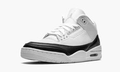 The Fragment Design x Air Jordan 3 is a collaboration between Hiroshi Fujiwara’s design studio and Jordan Brand on Michael Jordan’s third signature shoe. Rumored to originally be part of Fujiwara’s scrapped “The 10” collection, this collaborative Jordan 3 sports a simple color scheme of black and white, though it's full of intricate details that make this one of the most appealing Jordan 3 colorways on the market. Starting with the upper, white tumbled leather appears on either side of the shoe. Jordan Noir, 70s Converse, Hiroshi Fujiwara, Nike X Travis Scott, Nike Air Jordan 3, Converse Run Star Hike, Low Air Jordan 1, Jordan Sneaker, Converse Run Star