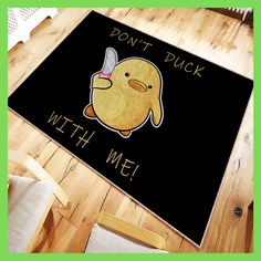 a rug with a cartoon duck on it that says, don't duck with me