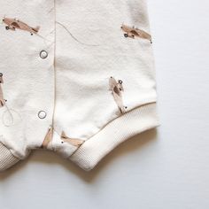 This little boy's romper is the perfect way to keep your child cool, comfortable, and stylish all summer long. The soft organic knit fabric will feel good against their skin as they play, and the snaps up the front make it easy to get in and out of. It also features a cute airplane design that will go with any outfit! Available in size NB- 2T CARE INSTRUCTIONS: Machine wash cold Gentle Cycle Tumble dry low or hang dry Warm iron if needed SHIPMENT & DELIVERY Orders will be ready for delivery with Unisex Casual Short Sleeve Bodysuit For Playwear, Cotton Short Sleeve Bubble Romper For Playtime, Casual Cotton Short Sleeve Bodysuit, Cotton Bubble Romper For Playwear, Casual Cotton Bubble Romper With Short Sleeves, Casual Short Sleeve Cotton Bubble Romper, Summer Short Sleeve Bodysuit With Cartoon Print, Summer Cartoon Print Short Sleeve Bodysuit, Cotton Cartoon Print Jumpsuits And Rompers For Playwear