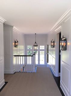 the hallway is clean and ready for us to use as an entrance way in this house