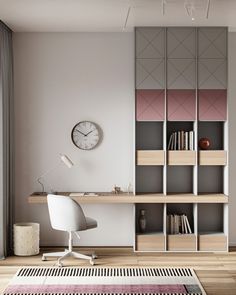 a room with a desk, bookshelf and clock on the wall above it