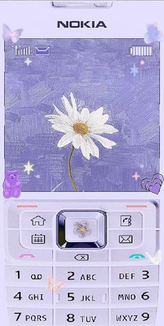 an old nokia cell phone with a white flower on the front and purple back cover