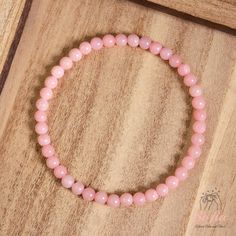 This Pink Opal stone bracelet is a stunning accessory that will brighten up your wrist and your mood. It is handmade with high-quality elastic cord and has a comfortable fit. It measures about 6.5 ~ 7 inches in length and can stretch to fit most wrists. The bracelet is easy to wear and take off, as it has no clasp or closure. This bracelet is perfect for anyone who loves boho chic style, natural stones. It is a unique and meaningful gift for yourself or someone special. You can wear it alone or stack it with other bracelets for a layered look. - Made to Order - Material : Natural 4mm Pink Opal stone - Bracelet Length: fit for 6 ~ 7 inches wrist, elastic - Hand Woven Bracelet with Love and Sincerity - Due to different light and screen, the color may be slightly different from the picture. - Boho Chic Style, Opal Bracelet, Woven Bracelets, Dainty Bracelets, Opal Stone, Healing Bracelets, Pink Bracelet, Pink Opal, Gemstone Healing