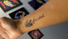 a woman's arm with a tattoo that says faith on it and flowers in the background