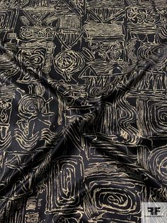 black and gold abstract print fabric