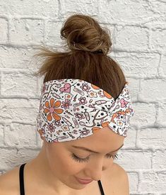 white twist headband with orange and pink medical theme print and flowers Trendy Adjustable Elastic Headband, Trendy Adjustable Headband With Elastic Band, Trendy Summer Headband With Elastic Band, Casual Bandeau Headband For Spring, Spring Casual Bandeau Headband, Adjustable Elastic Headband For Spring, Adjustable Bandeau Headband For Spring, Casual Adjustable Hair Accessories With Matching Headband, Trendy Bandeau Headband, One Size Fits Most