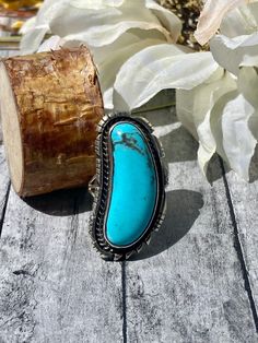 Navajo Made Kingman Turquoise Sterling Silver Ring Size 5.75. It measures 1 3/8 inches long and just over 5/8 of an inch wide. Signed by the artist and stamped sterling silver. Thank you for checking out my store, if you have any questions please contact me!! SKU:39997126639701_664D* Turquoise Concho Ring As Gift, Turquoise Concho Ring For Gift, Turquoise Concho Ring As A Gift, Southwestern Style Stamped Turquoise Ring As Gift, Southwestern Stamped Turquoise Ring Gift, Untreated Blue Turquoise Western Ring, Unique Stamped Turquoise Ring, Southwestern Stamped Turquoise Ring, Western Style Untreated Turquoise Ring