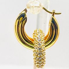 These highly coveted earrings are the perfect size. They are beautiful and so sparkly signed Celine. They are in pristine condition and can be worn with or without the second rhinestone ring. The gold hoops by themselves are a classic and comfortable look for daytime. Going out to dinner after a long day simply add the sparkly second ring and now you've got a classy and elegant evening look with sparkle that catches everyone's adoration.     These are 18k yellow gold HEAVILY plated no sign of wear to the gold. They are from the late 1990's runway shows. They are guaranteed authentic or your money back. They have already passed authentication with a very large auction house and I'm happy to pass the info along to you at purchase. If for any reason you do not love the item I will pay for the Luxury Sparkling Yellow Gold Diamond Earrings, Formal Gold Diamond Hoop Earrings, Dazzling Yellow Gold Diamond Earrings For Evening, Dazzling Gold Hoop Earrings With Pave Setting, Gold Dazzling Hoop Earrings With Pave Setting, Gold Earrings With Pave Setting For Formal Occasions, Gold Pave Setting Earrings For Formal Occasions, Gold Huggie Earrings With Pave Setting For Wedding, Classic Gold Earrings With Pave Setting