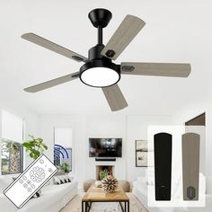 a living room with a ceiling fan and remote control