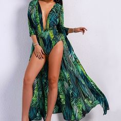 Green Tropical One-piece For The Beach, Green Tropical One-piece For Beach, Green Long Sleeve Beachwear Swimwear, Fitted V-neck Swimwear For Beach Cover-up, Green Long Sleeve Swimwear For Beach, Green V-neck Bodysuit For Summer, Green Bodysuit For Beach Season Vacation, Tropical Green Bodysuit For The Beach, Tropical Green Bodysuit For Vacation