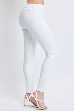 The 2000's called and low-rise jeans are back! Our Women's WannaBettaButt Low-Rise 1-Button Skinny Jean is the new hottest style of the year. Featuring our famous WBB heart shaped stitching, enhancing your natural curves. Constructed with stretchy denim fabric made from recycled fibers - you'll not only look amazing, but you'll feel amazing too! Pair these with a crop top for an extra flirty look! Product Details - Low-Rise - 1-Button Closure with Zipper - 5 Pocket Construction Size & Fit (based Ymi Jeans, L And Light, Cute Jeans, Natural Curves, Low Rise Jeans, Light Blue Color, Denim Fabric, Medium Blue, Low Rise