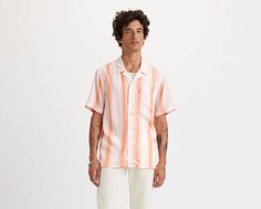 No summer line-up's complete without our Sunset Camp Shirt. It breathes the relaxed vibe that summer's all about, but is slightly more stepped-up than a T-shirt. A soft, lightweight and breathable camp shirt Cut with a roomy fit We made this garment with TENCEL™ Lyocell, a soft fiber sourced from wood. TENCEL™ is a trademark of Lenzing AG. Spring Camp Collar T-shirt With Relaxed Fit, Spring Camp Shirt With Relaxed Fit And Camp Collar, Relaxed Fit Camp Collar Shirt For Spring, Relaxed Fit White Shirt For Summer, White Relaxed Fit Shirt For Summer, Summer White Relaxed Fit Shirt, Casual Tops With Camp Collar For Vacation, Casual Camp Collar Tops For Vacation, Vacation T-shirt With Relaxed Fit And Camp Collar