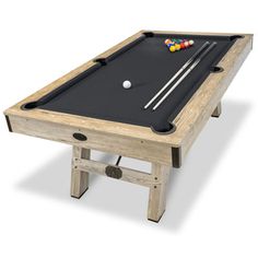 a pool table with two cues and three balls on the top, in front of a white background