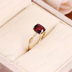 "(Please confirm your US size when you make an order) Jewelry Details -Gold Type : 14k gold Center Stone: NATURAL Garnet 6*7mm, Approximately 1.25ct Color: 3A Clarity: VS Cut: Cushion Cut / 3EX Side Stone: Natural Diamond,0.02ctw Color: G-H Clarity: SI1 Cut: Round Cut / 3EX Band Width: Approximately 1.2mm SKU: YR0453 ~*-*~Purchase Guarantee: - All our jewelry is handmade, and each process is refined. - 14 Day Refund Guarantee. - All our products are Free Shipping. - Free Gift Box&Packing. ~* Elegant Stackable Ruby Wedding Ring, Elegant Stackable Ruby Ring For Wedding, Minimalist 14k Gold Proposal Rings, Elegant Gold Stackable Rings For Proposal, Minimalist Cushion Cut Anniversary Ring, Elegant Cushion Cut Ruby Promise Ring, Elegant Cushion Cut Ruby Ring In Yellow Gold, Elegant Cushion Cut Ruby Ring For Wedding, Elegant Cushion Cut Ruby Wedding Ring