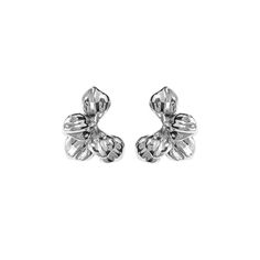 This delicate floral stud earrings lend an air of sophisticated grace to any ensemble. Accessorize your outfit with these floral studs for a touch of elegance and charm! 18K Silver Stainless Steel Lightweight: .41 oz Measurements: Approx 1" x 0.8" Push Back Closure 100% Eco-Friendly; No Nickel, Chromium and Lead Water-resistant, sweat-proof, hypoallergenic and tarnish-free. You can work out in our durable jewelry, wear it to the beach, pool or even shower with it. Silver Feminine Flower Earrings For Formal Occasions, Elegant Clip-on Earrings With Flower Charm, Feminine Silver Flower Earrings, Elegant Silver Flower Clip-on Earrings, Feminine Silver Drop Flower Earrings, Feminine Silver Flower Drop Earrings, Elegant Metal Earrings With Flower Charm, Feminine Silver Earrings For Formal Occasions, Silver Tarnish Resistant Wedding Earrings