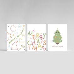 three christmas cards with different designs on them