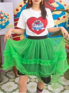 Material: 100% Polyester
 Size: One size
 
 Model: 168cm/45kg




 Length
 Waist


 one size
 74cm
 60cm Green Tulle Bottoms For Summer, Green Asymmetrical Skirt With Ruffles, Green Tulle Skirted Bottoms, Green Ruffled Dress With Skirt Shape, Green Ruffled Flared Skirt, Asymmetrical Tulle Skirt For Summer, Green Tulle Flared Skirt, Green Ruffled Skirt, Gauze Skirt