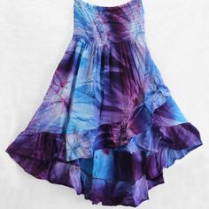 Fantastic Tie-Dye Ruffled Hi-Lo Skirt Can Also Be Worn As A Top! Brand New From Importer, Available In Small, Medium And Large. Beautiful Blues & Purples, Fun & Flirty And Extremely Comfortable. Light Weight, Soft And Flowy, 100% Rayon Fabric. Elastic Top Stretches To Fit Without Binding Or Rolling. Skirt Is About 21 Inches In Front To 33 Inches In Back. Gentle Wash, Drip Dry Recommended. Peaceful People, Elastic Top, Convertible Top, Drip Dry, Rayon Fabric, Blue Purple, High & Low, Binding, Convertible