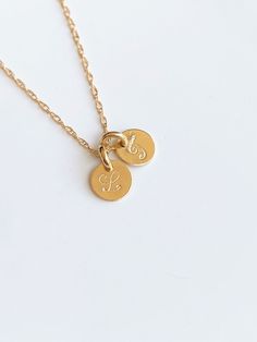 14k Gold Initial with 14k solid gold cable chain , rope chain and box chain. This is a super, super cute necklace. It's is very simple and perfect with any outfit . This listing for One initial disc and one heart charm in 14k gold chain . All components onto 14k solid gold. If you want to add initial or heart charm , please let me know . This beautiful necklace consists of... -6mm 14k solid Initial disc, -14k real Solid gold chain , -Come up with beautiful ribbon gift box and -One set of Care in 14k Gold Coin Pendant Necklace For Everyday, Everyday 14k Gold Coin Necklace, 14k Yellow Gold Filled Charm Necklace With Coin Pendant, 14k Gold-filled Yellow Gold Charm Necklace With Coin Pendant, 14k Gold-filled Yellow Gold Coin Pendant Charm Necklace, Yellow Gold Coin Charm Necklace With Adjustable Chain, 14k Gold Filled Charm Necklace With Coin Pendant, Dainty Adjustable Charm Necklace With Coin Pendant, 14k Gold Filled Yellow Gold Coin Necklace