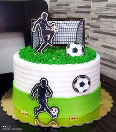 a cake decorated with soccer themed icing