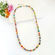 Kantha Sonnet Necklace - Mango + Main Multicolor Beaded Chain Necklace With Metal Beads, Adjustable Colorful Beaded Necklace For Festivals, Multicolor Metal Beaded Chain Beads, Multicolor Metal Beaded Bracelets, Long Beaded Necklace For Festivals, Festival Multicolor Metal Beaded Bracelets, Spiritual Faceted Beads Beaded Necklace For Festive Occasions, Bohemian Long Necklace With Faceted Round Beads, Long Metal Beaded Necklaces With Beaded Chain